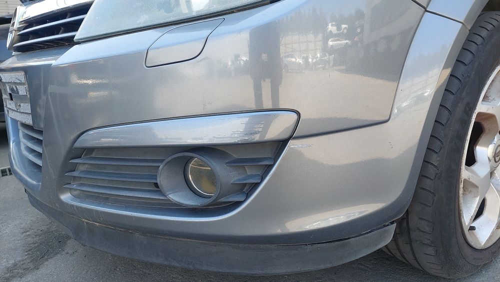 Pára-choques frente OPEL Astra H Caravan (L35)