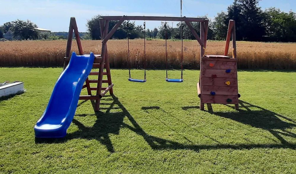 Drewniany Plac Zabaw do Ogrodu OLAF 2Huśtawki Ślizg Ścianka PRODUDENT