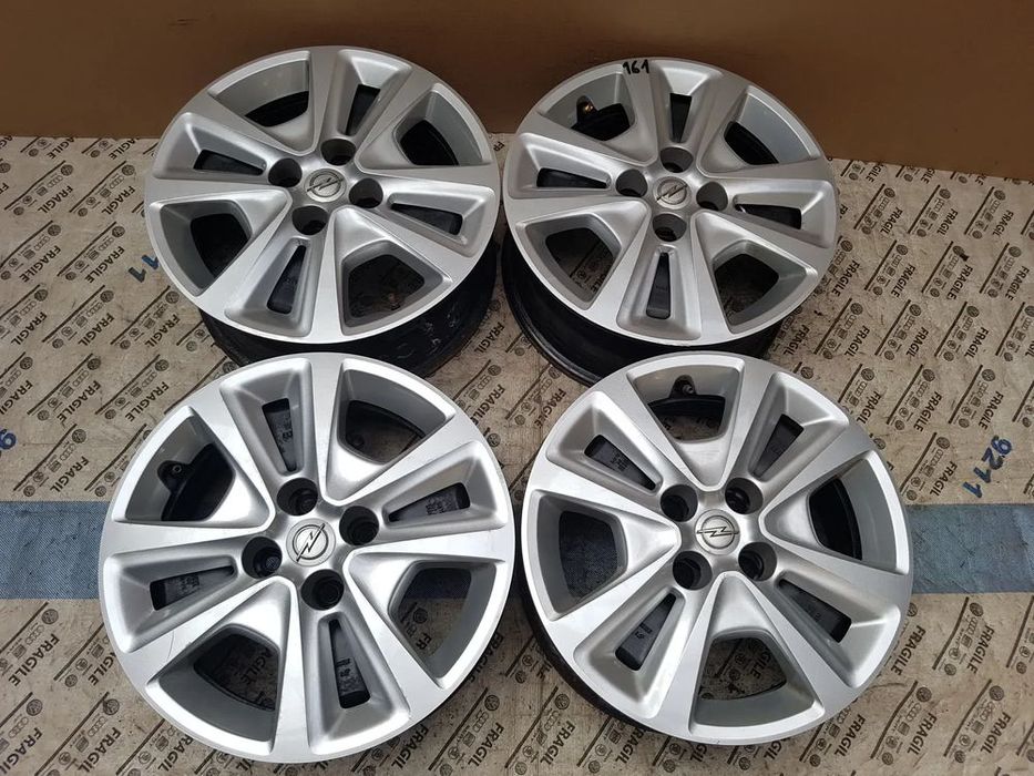 Felgi strukturalne kołpaki czujniki tpms Opel Corsa  D E Adam Fiat Gra