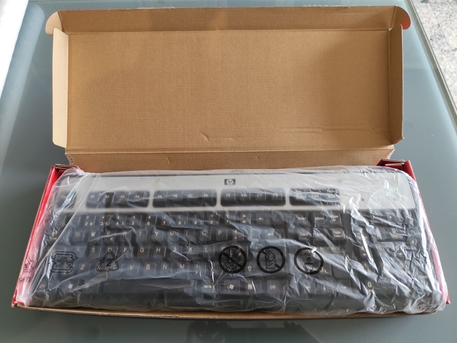 Teclado HP QWERTY KU-0316 Português preto e prata (c