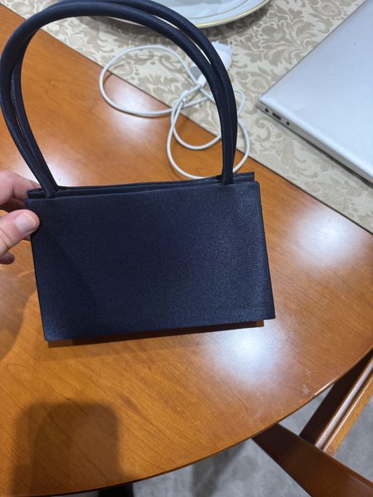 Mala cetim em estado novo