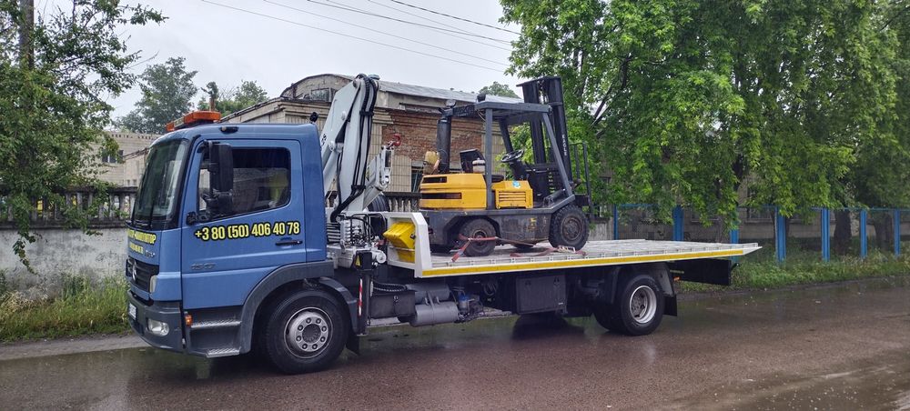 Послуги евакуатора та маніпулятора Суми і область.