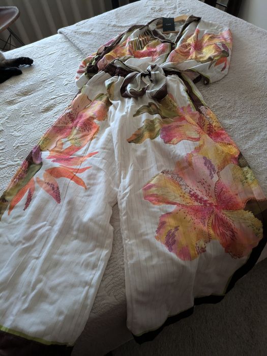 Fato CAWÉ com etiqueta