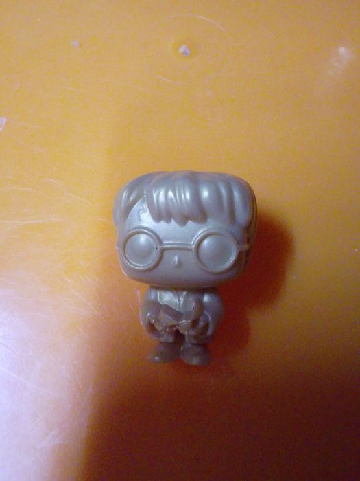 Коллекционная фигурка гарри Поттера золотая