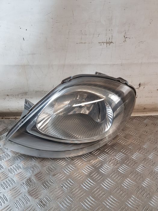 Lampa Lewa Przód 91165719 Opel Vivaro A 02R- Europa
