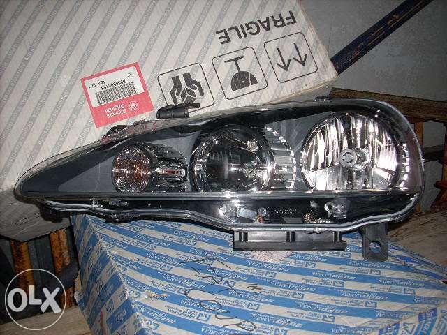 Farol esq alfa 147 xenon