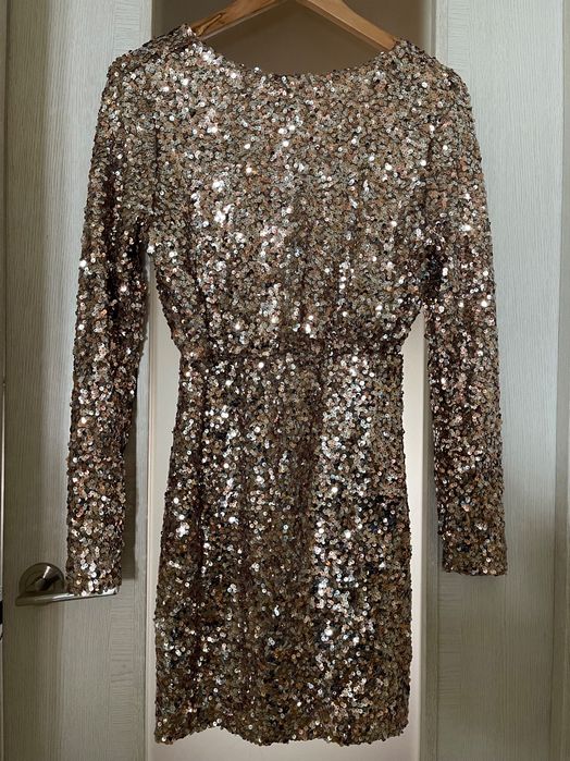 Vestido de lantejoulas dourado