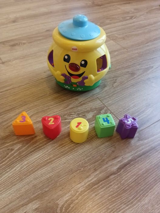 Fischer Price Grający garnuszek sorter