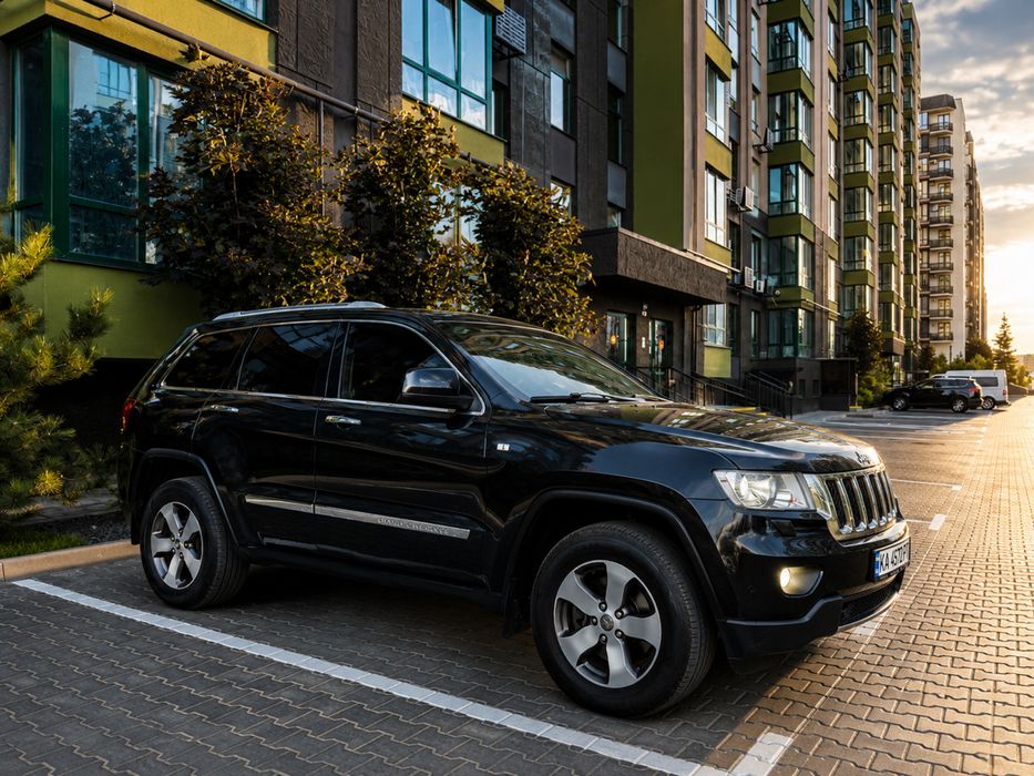 Jeep Grand Cherokee 2012 VIN 1C4RJFCM9CC228233 фото оголошення 2 з 24