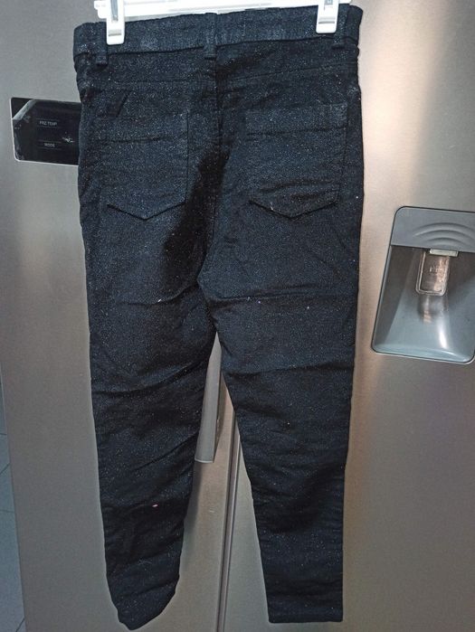 Calças pretas com brilho NOVAS 10/11 anos