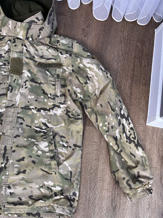 Продам куртку мультикам б/у