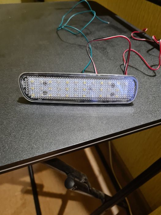 Задний левый катафот