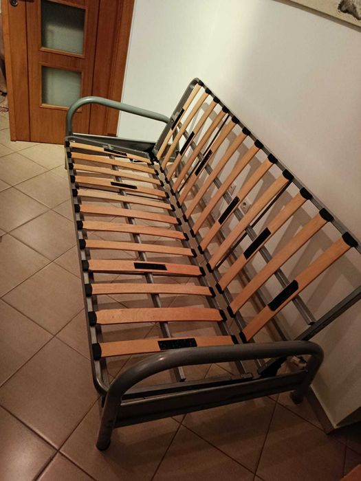 Sofá cama três lugares