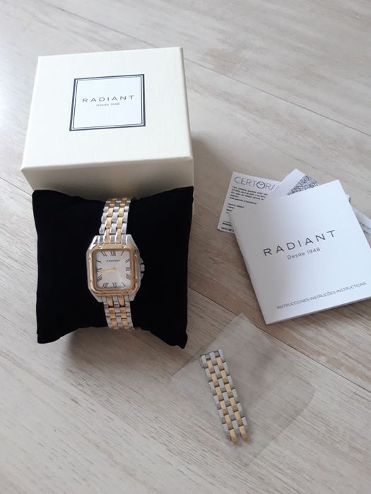 Relógio prateado e dourado Radiant
