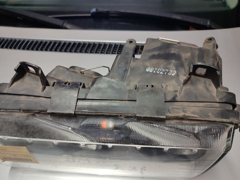 Farol BMW E36 esquerdo