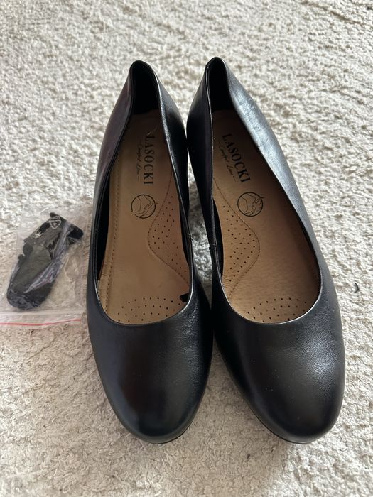 Тушлі жіночі на маленькому каблуку