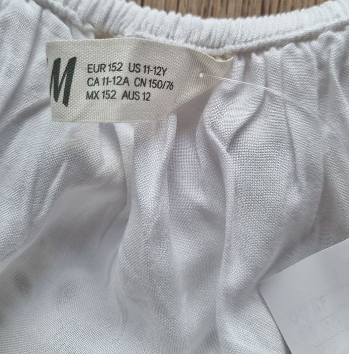 Bluzeczka z falbanką 152cm