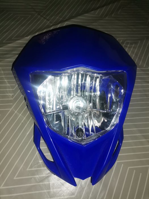 Farol de mota novo na caixa