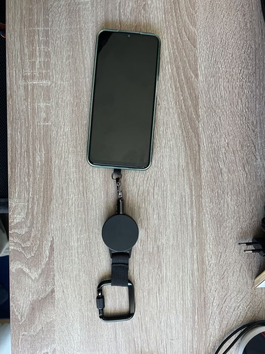Suporte anti roubo/queda para telémóvel
