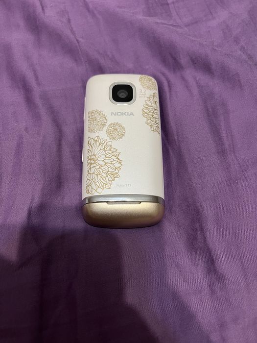 Продам сенсорный  Nokia 311 состояние отличное,рабочий
