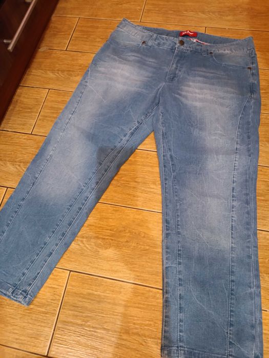 Spodnie 7/8 jeansy damskie niebieskie 44