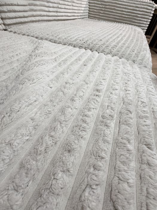 Sofa sztruksowa z pufą