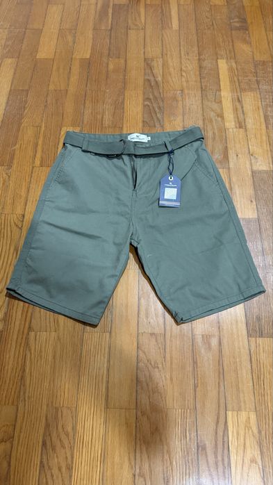 Calções verdes da American College