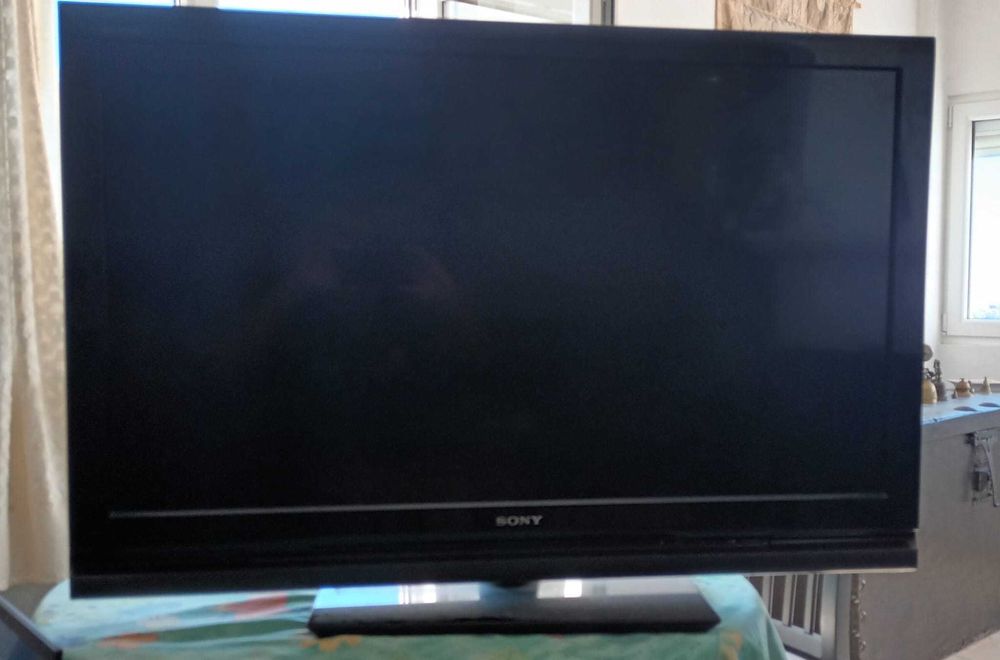 SONY TV Set, Samsung DVD Player, and 80 DVDs