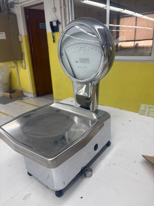 Balança de precisão para Lã e outos fins .