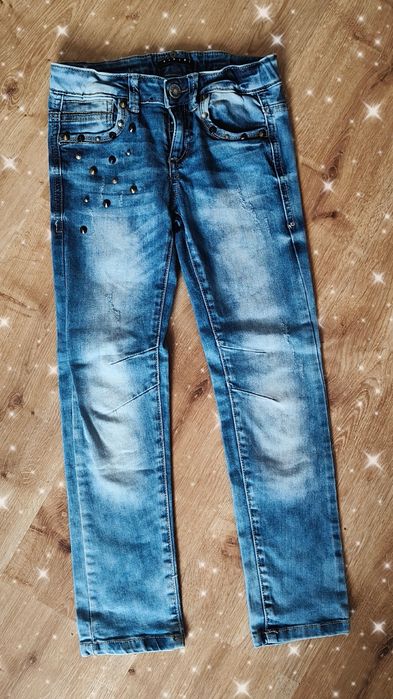 Spodnie dziewczęce jeansowej jeansy z nitami 122 128 cm Benetton
