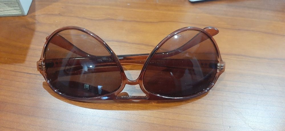Oculos de sol castanhos64751416911233120