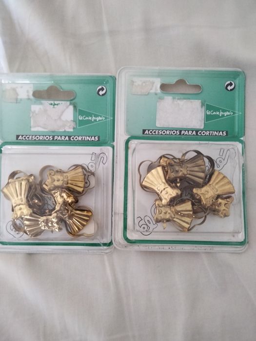 Molas para prender cortinas ou cortinados