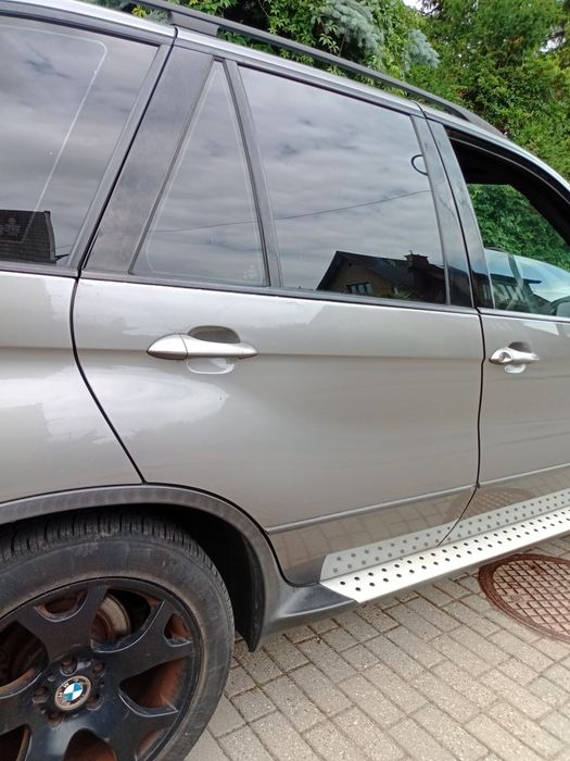 Drzwi prawe tył BMW X5 e53 Sterlinggrau 472