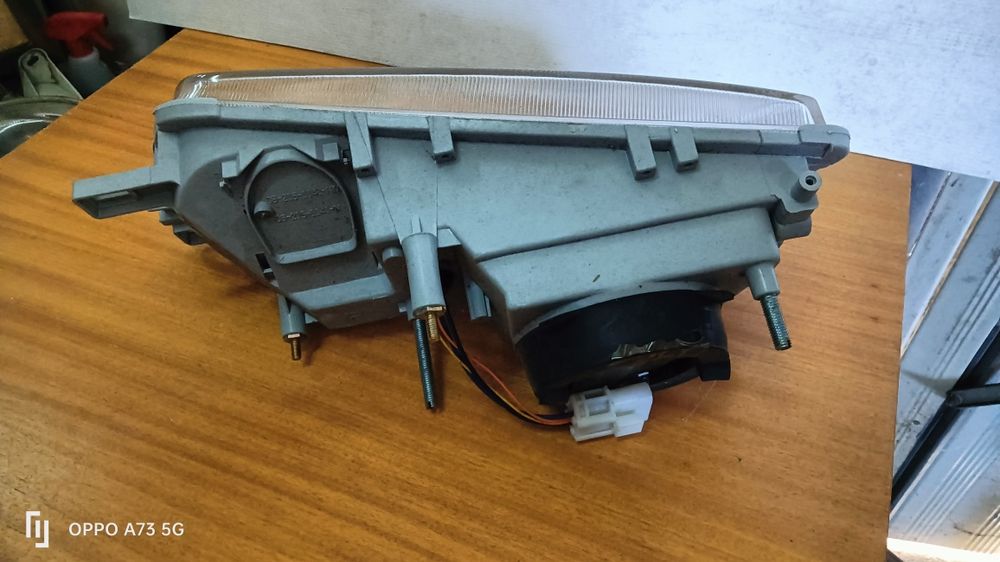Farol Nissan Primera ótica 1990 direita