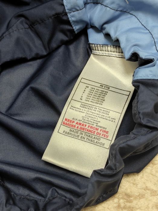 Синя вітровка Nike