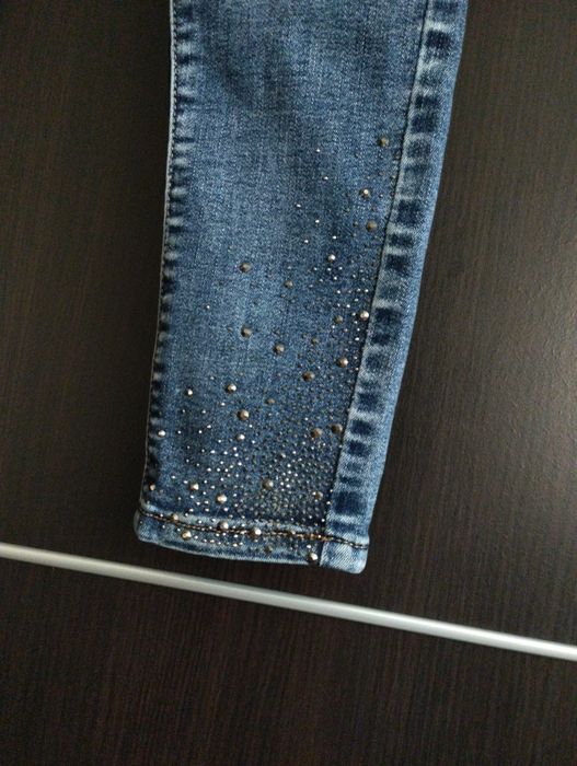 Spodnie jeansowe rurki cyrkonie wysoki stan