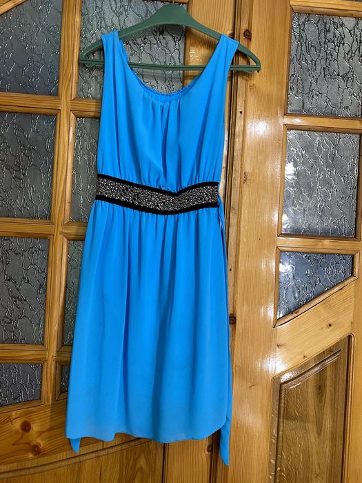 Сукня блакитного кольору