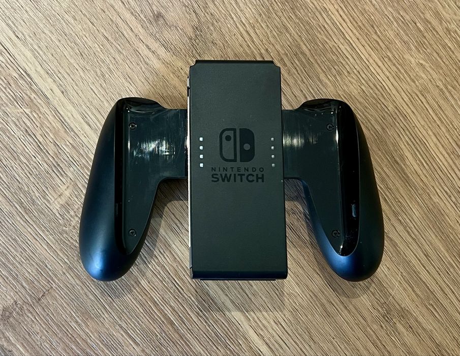 Nintendo Switch, remote and 3 games