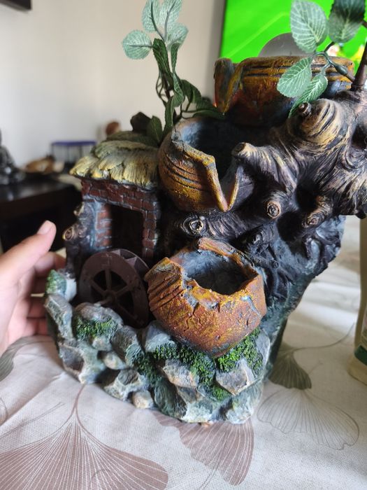 Fonte decorativa elétrica com água