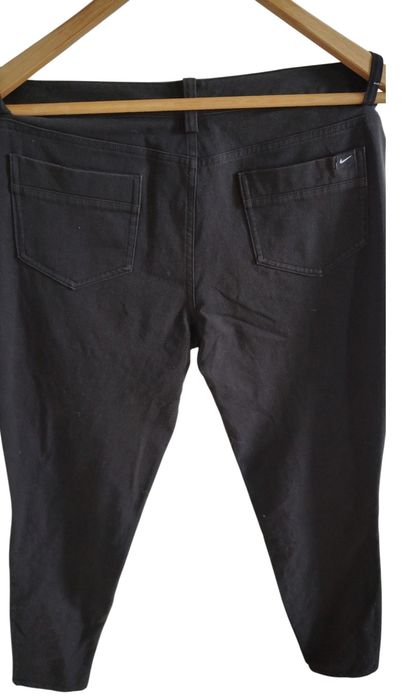 Markowe elastyczne spodnie jeans firmy Nike r 38 M czarne