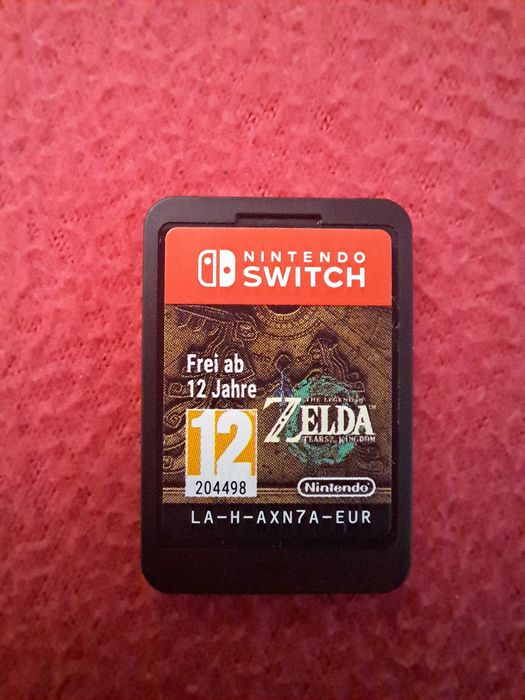 Nintendo Switch OLED (Como Nova) + Zelda Tears of the Kingdom + 4 Comandos