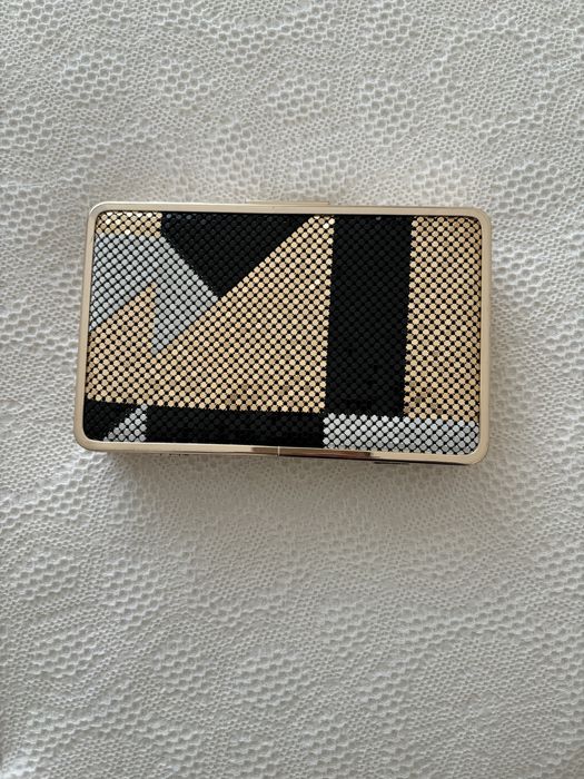 Clutch dourada da Parfois