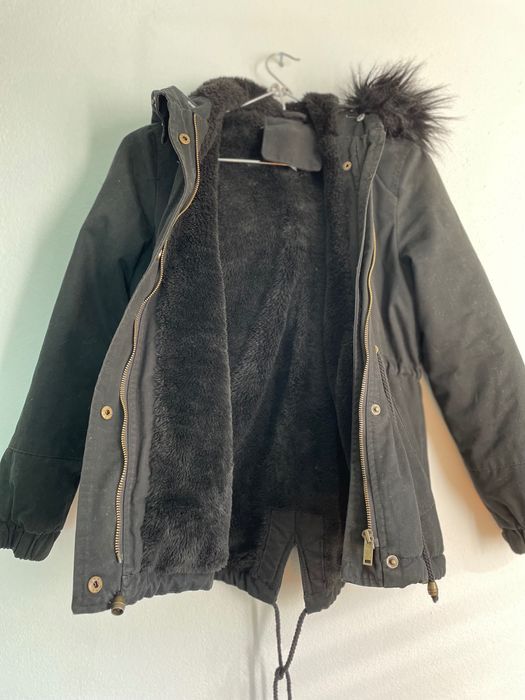 Quispo preto com carapuço