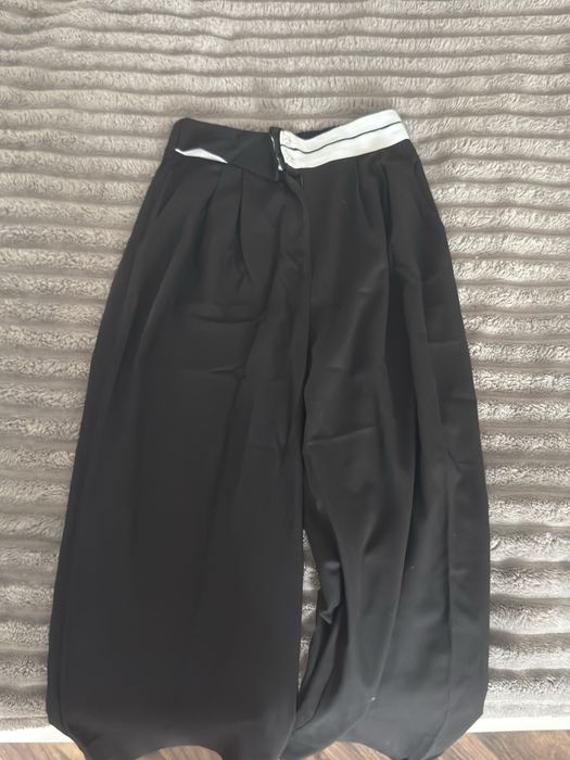 брюки чорні,кльош