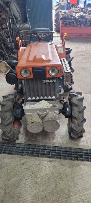 Trator    kubota com freza