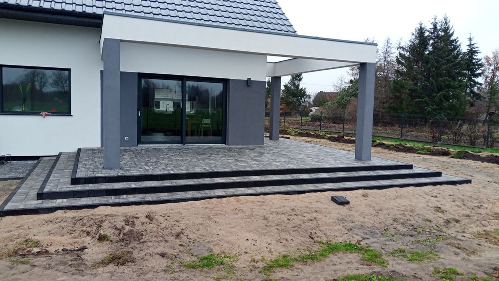 Profesjonalne układanie kostki brukowej. Budowa domków letniskowych..