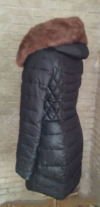 Теплий та зручний пуховик