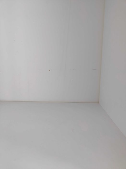 Regał biały asymetryczny nowoczesny półka na książki design