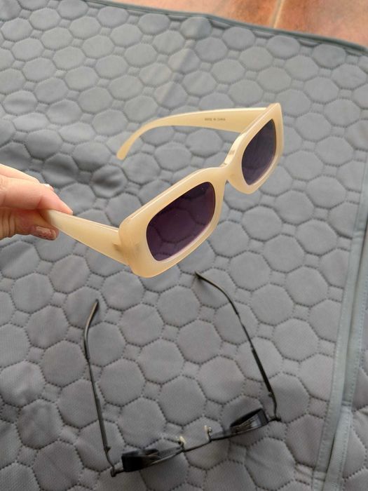 óculos de sol, como novos