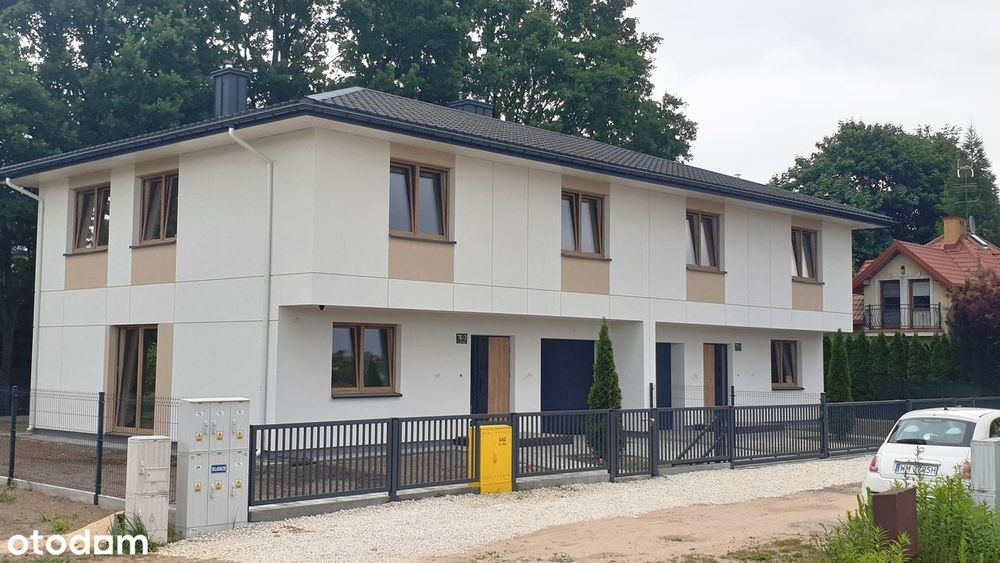 Dom bliźniak z garażem w spokojnej okolicy